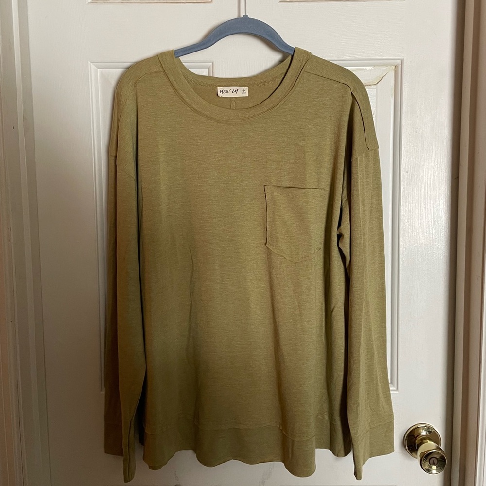 New In long sleeve shirt size L, lime green. Like new!
